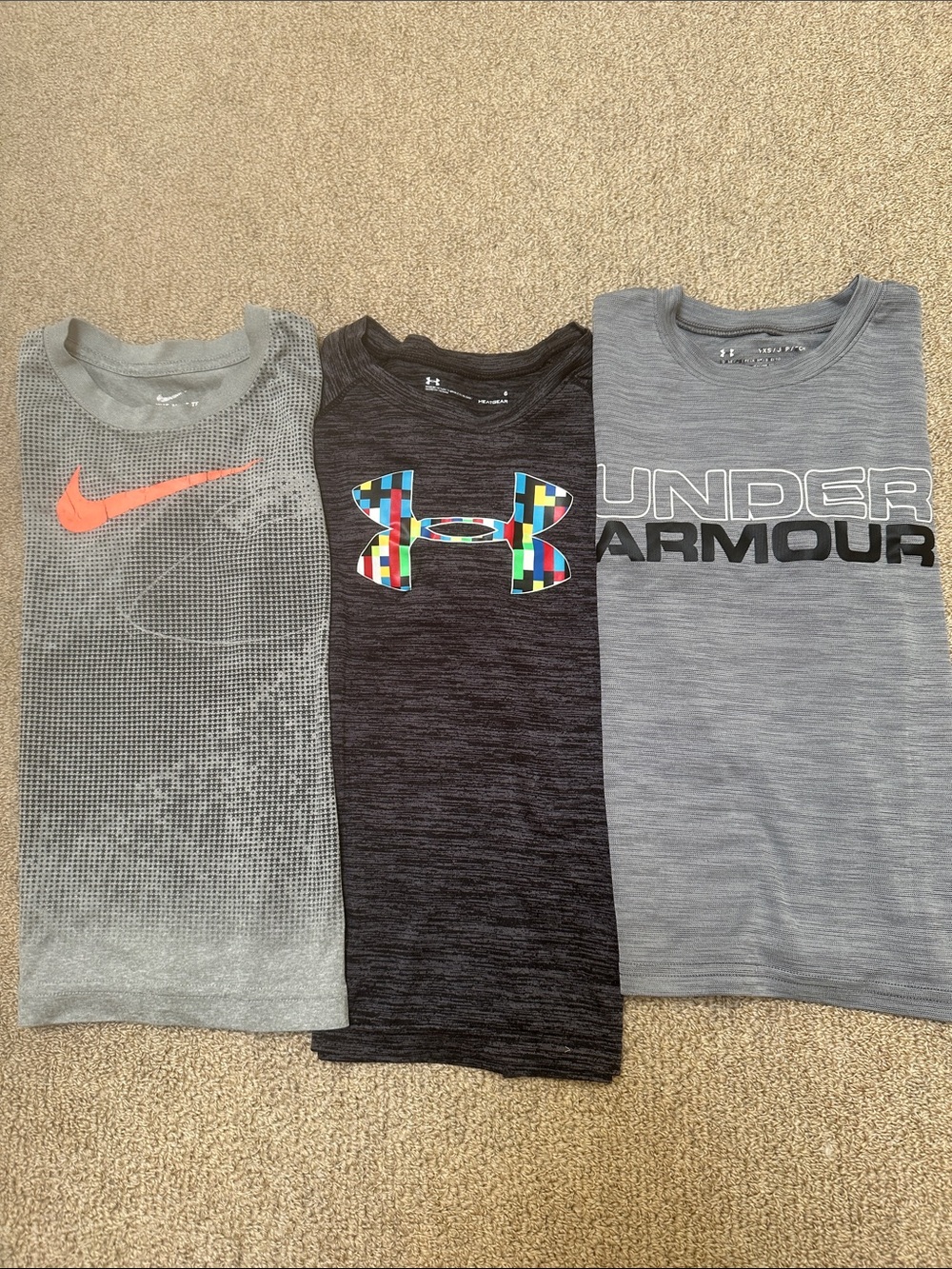 Two Under Armor Heatgear tee and one Nike dry fit tee - Bundle